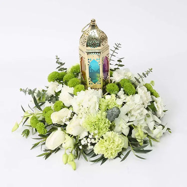 Cluster Pink White and Green Table Arrangement, White Hydrangea, White Roses, Green Carnations, White Carnations, White Orchids, Green Button Chrysanthemums, Parvifolia, Eucalyptus, Gypso, Lantern, Centertable Arrangement